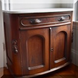 F24. Victorian bow front marble top commode. 31”h x 33”w x 18”d 